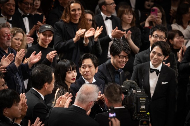 The Exit 8 team responds to a standing ovation at Cannes